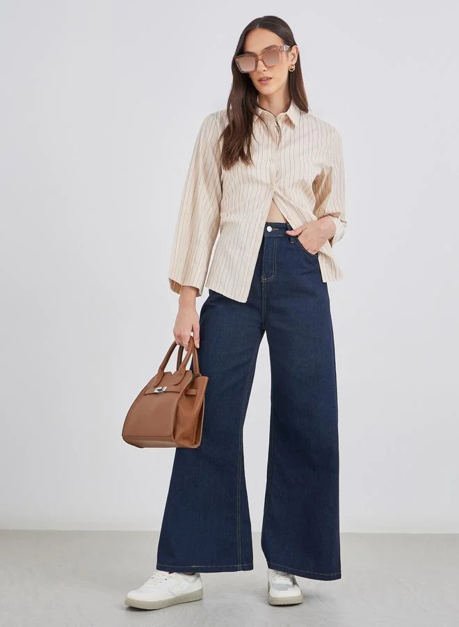 ستايلي قميص بيج مخطط بياقة عريضة بقصة مريحة