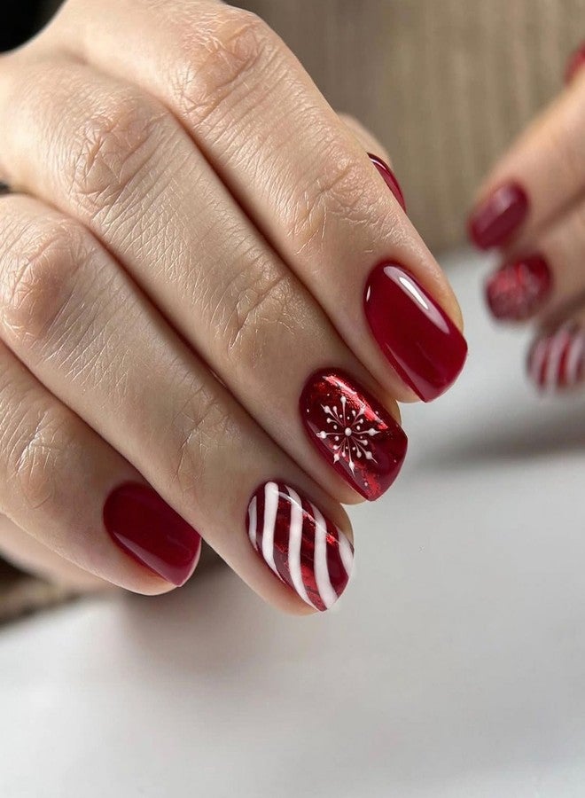 OCOUYVD Christmas Press on Nails Short Red Square Shaped Fake Nails Glossy False Nails with Snowflake Candy Stripe Design Full Cover Acrylic False Nails Winter Christmas Glue on Nails for Women 24 Pcs - Image 1