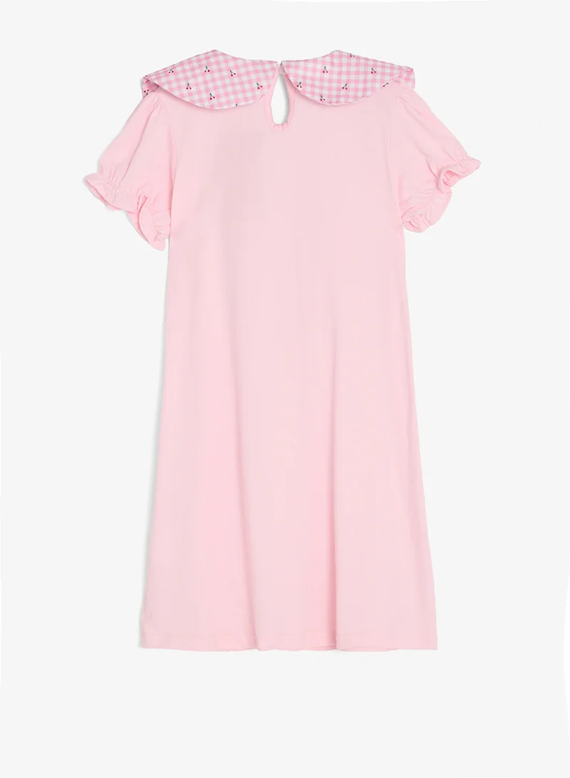 بنياتا فستان بياقة