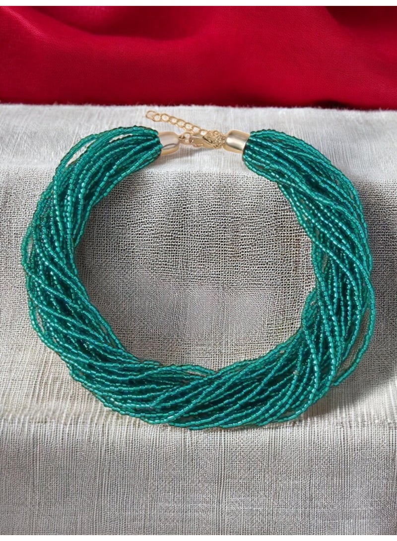 ANUM BY MUNA Handmade Twisted Beaded Necklace in Emerald Green – Elegant Design - Image 1
