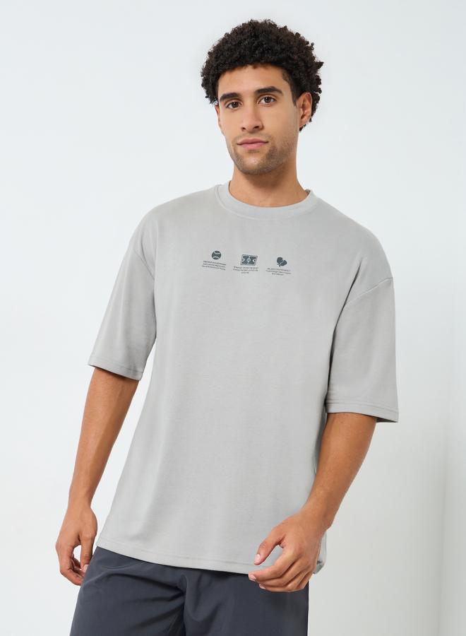 Styli Active Men Oversized Minimal Print T-Shirt - Image 1