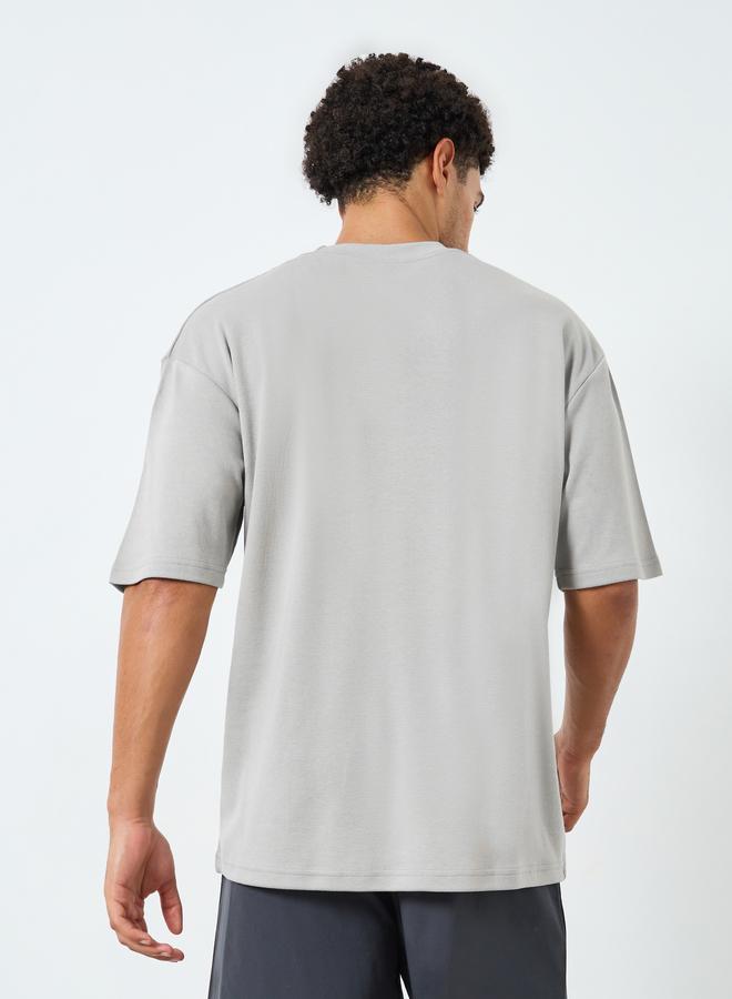 Styli Active Men Oversized Minimal Print T-Shirt - Image 3