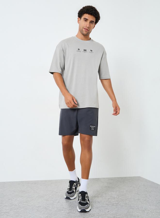 Styli Active Men Oversized Minimal Print T-Shirt - Image 4