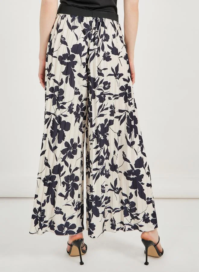 Styli All-Over Floral Print Ankle Length Wide Leg Pants