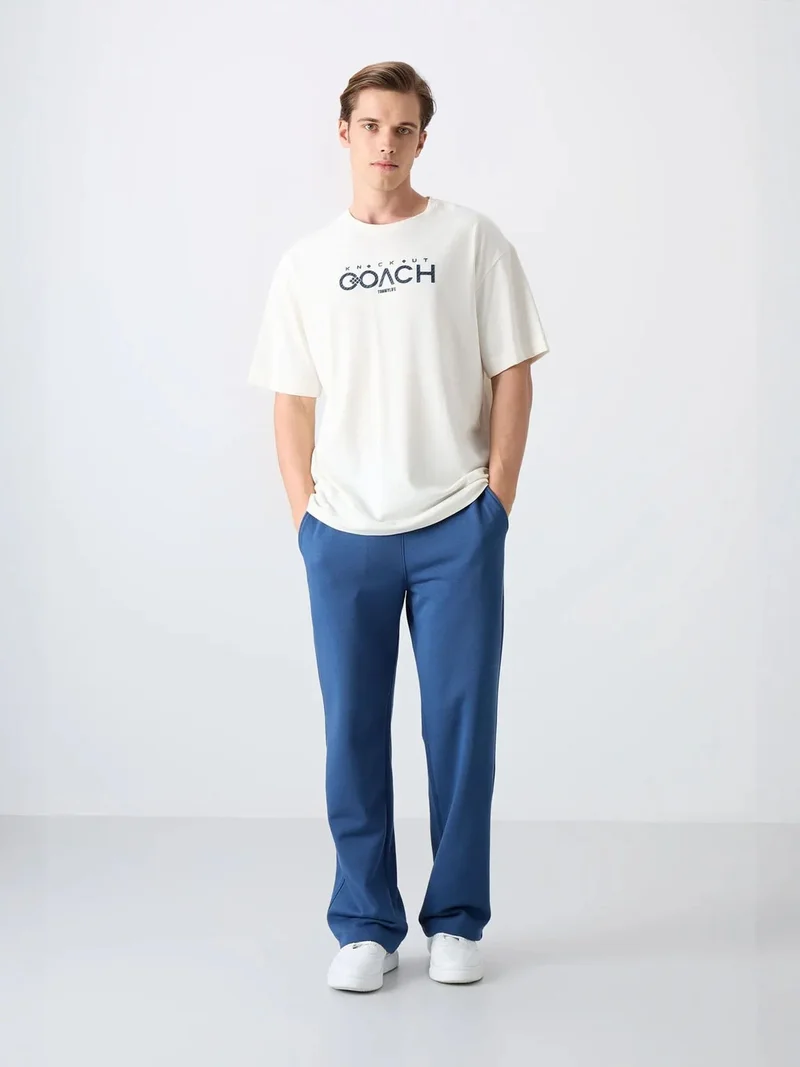 TOMMYLIFE TOMMY Oversized Logo Patch Crew Neck T-Shirt
