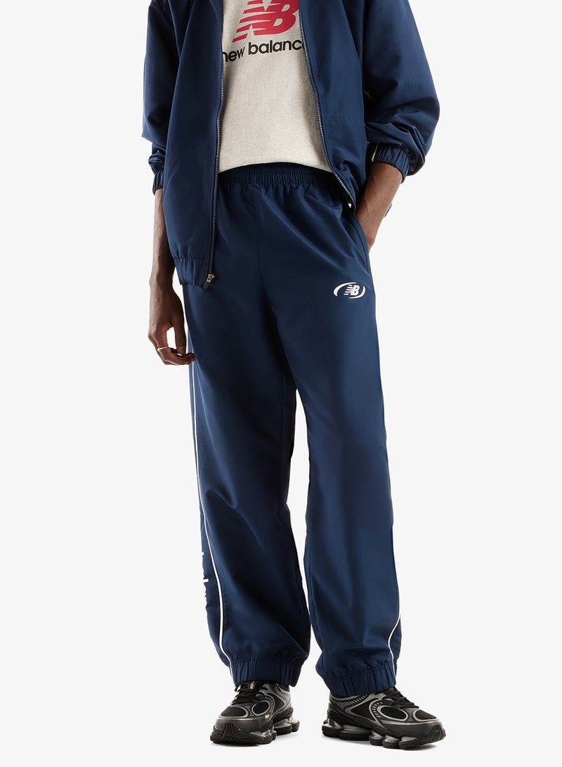 New Balance Trackside Woven Sweatpants - Image 1