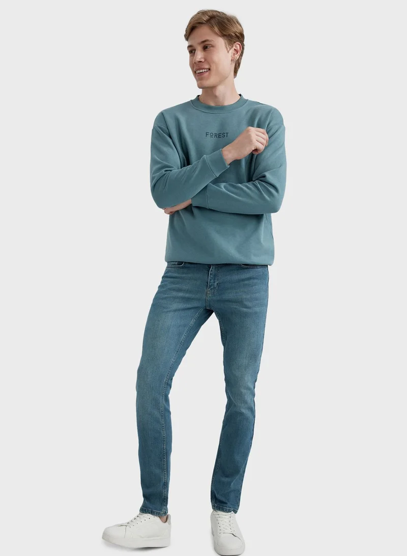 DeFacto Mid Wash Slim Fit Jeans