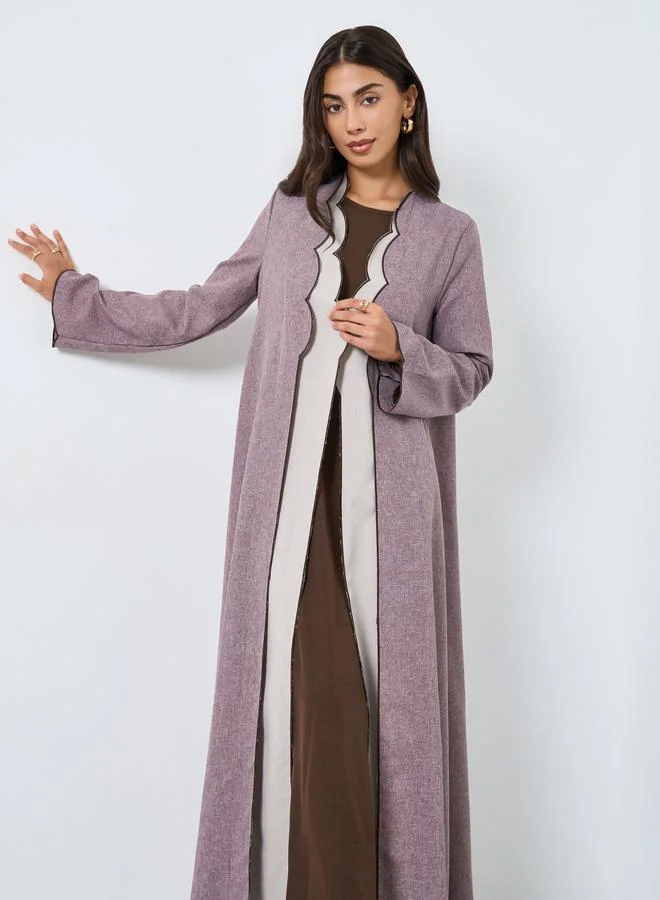 ستايلي عباية مفتوحة من الأمام مزينة بنمط صدف