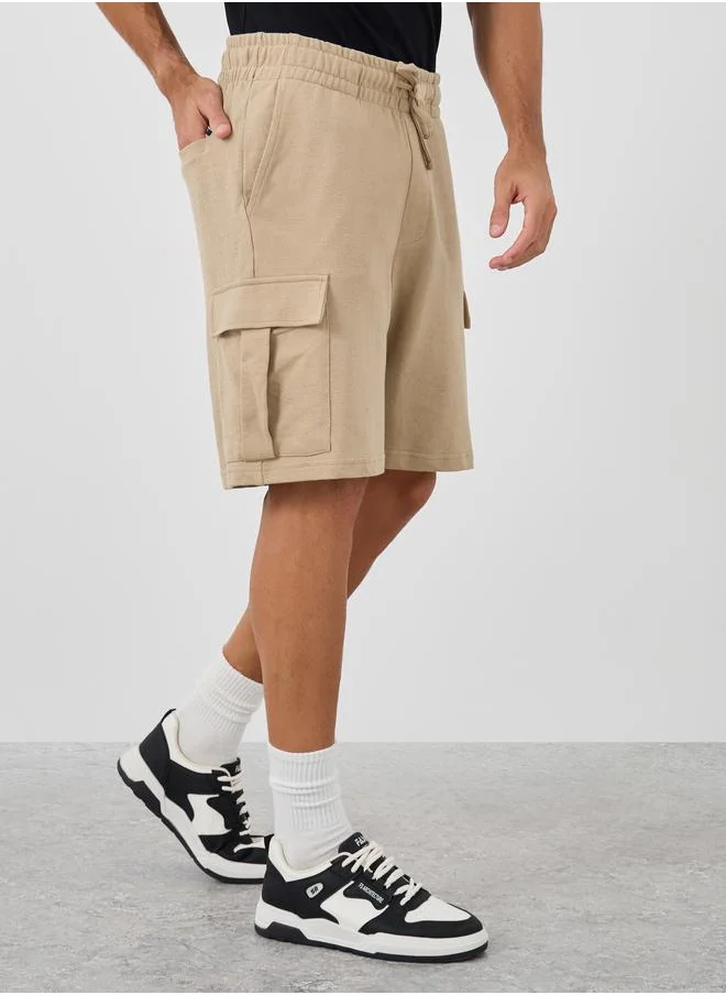 جاك اند جونز Jack & Jones Solid Mid Rise Shorts with Cargo Pockets