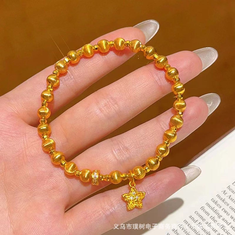 PS Luxury Gold-Plated Bracelet with Star and Moon Charms - Elegant and Versatile Accessory for Women - Image 1