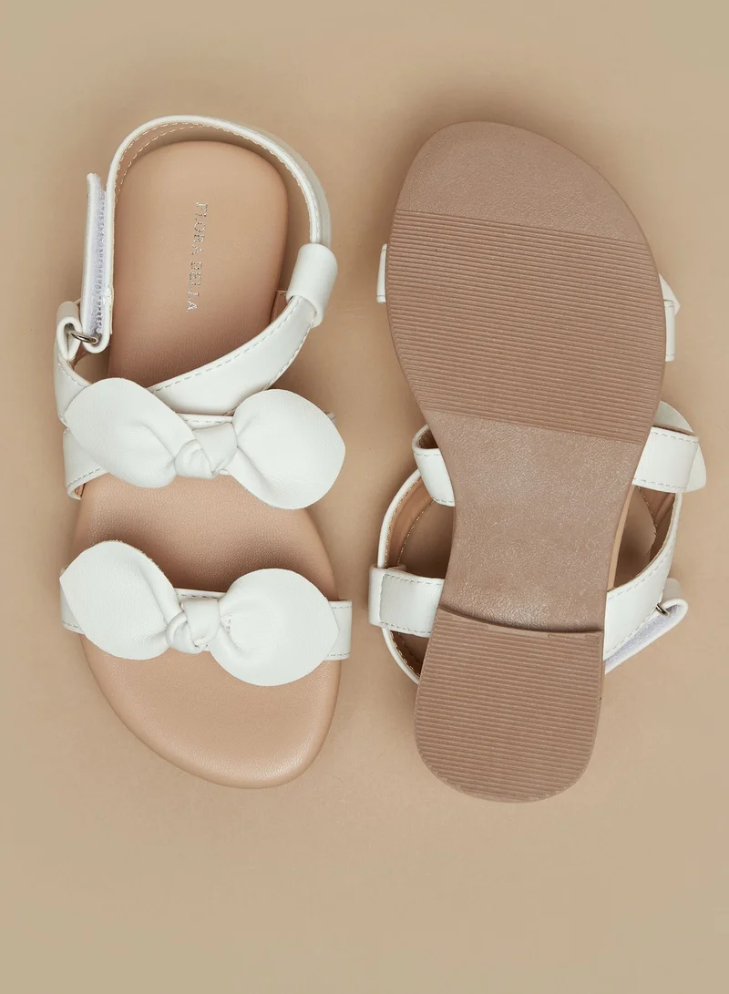 فلورا بيلا من شو إكسبرس Girls Bow Accent Sandals with Hook and Loop Closure