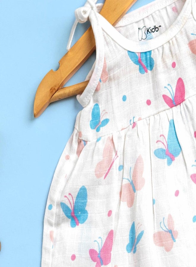 معرف com لهذا التطبيق هو فستان بدون أكمام من القطن العضوي 100% من كيدبيا® لحديثي الولادة | فستان موسلين كاجوال للأطفال الرضع - بنقشة النجوم والفراشات والحوت (9-12 شهرًا) - Image 4