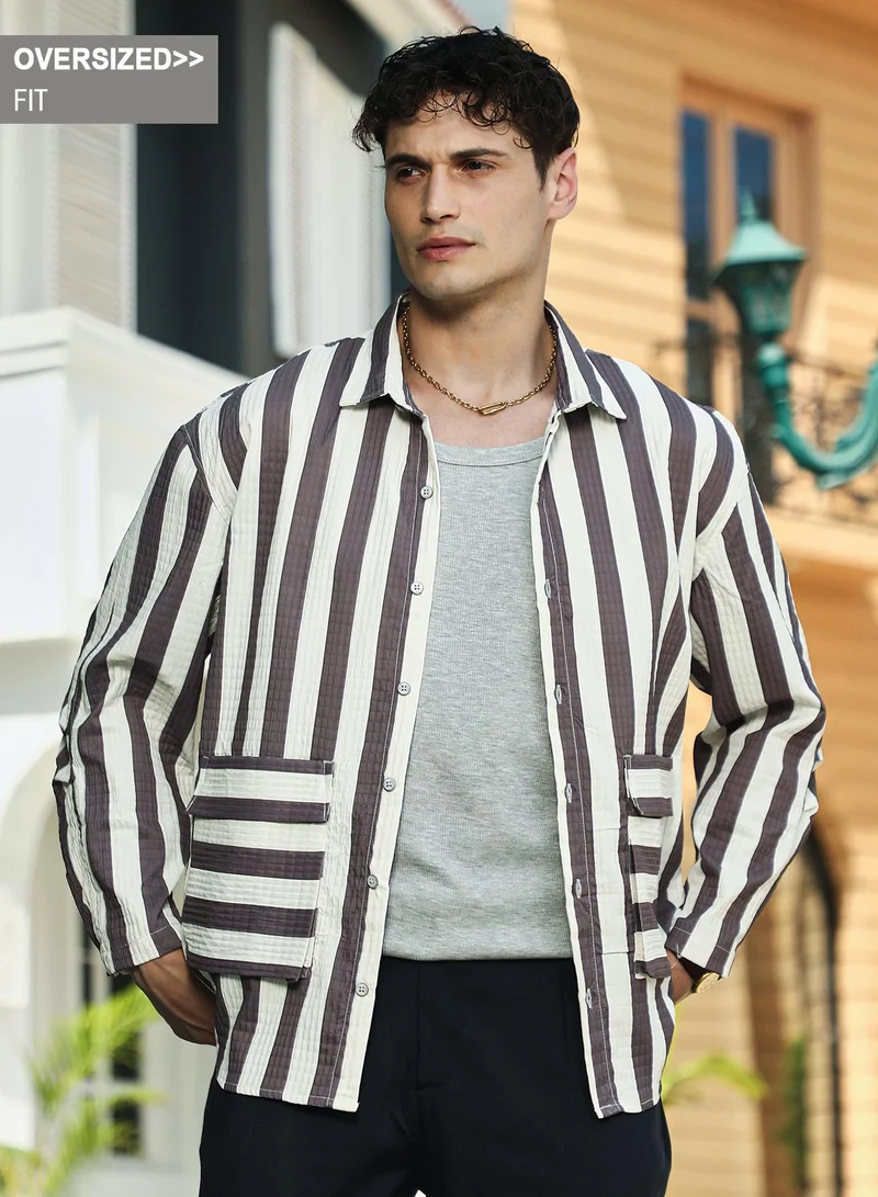 Campus Sutra Campus Sutra Men's Brown & White Candy-Striped Utility Oversized Shirt For Casual Wear | Spread Collar | Long Cuff Sleeve | Button Closure | Oversized Shirt Crafted With Comfort Fit For Everyday Wear