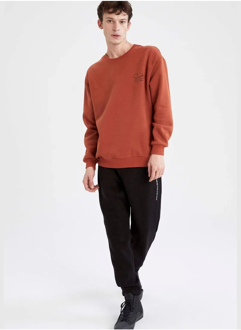 ديفاكتو Boxy Fit Long Sleeve Back Print Sweatshirt