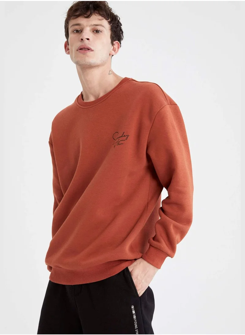 ديفاكتو Boxy Fit Long Sleeve Back Print Sweatshirt