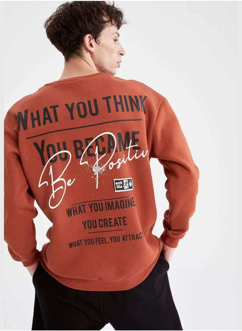 ديفاكتو Boxy Fit Long Sleeve Back Print Sweatshirt