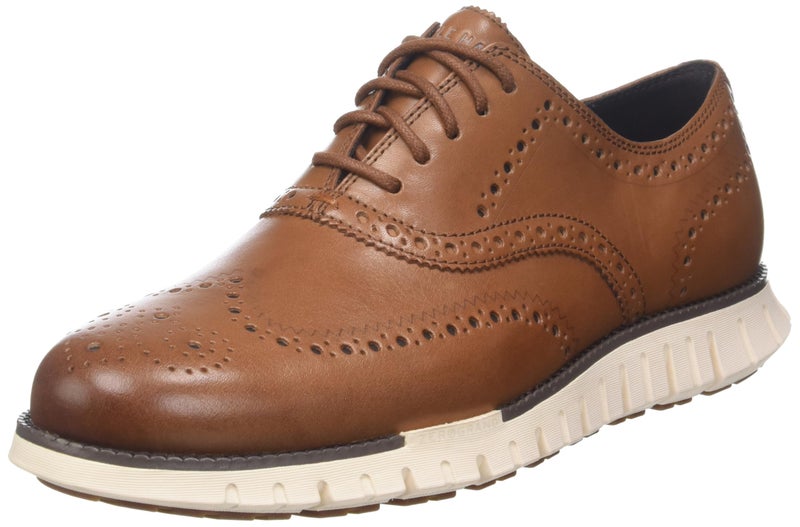 Cole Haan Mens Zerogrand Remastered Wing Tip Oxford, British Tan/Ivory, 7-W US - Image 1