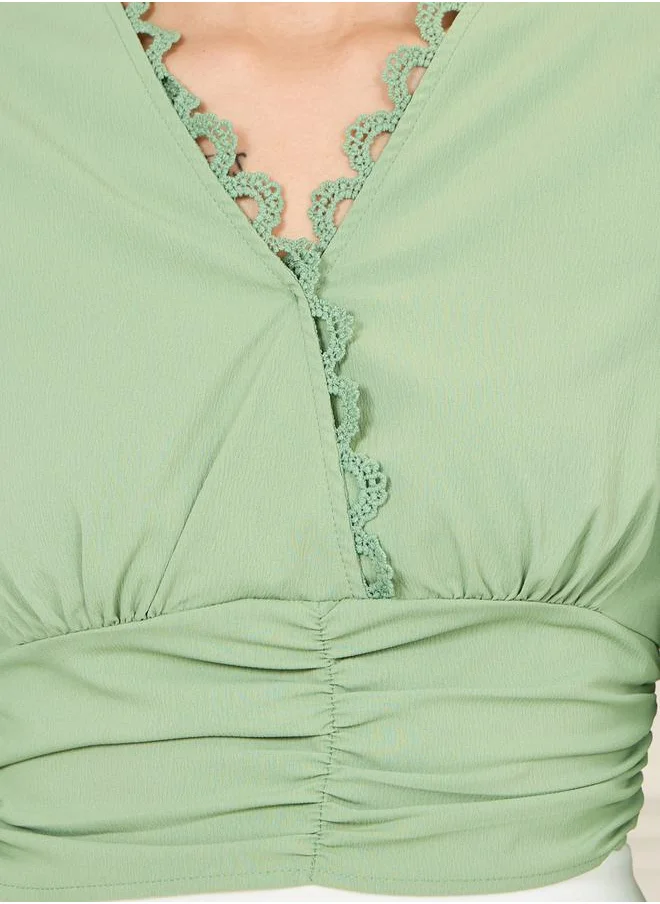 Styli Crepe Lace Trim Back Tie Up Crop Top