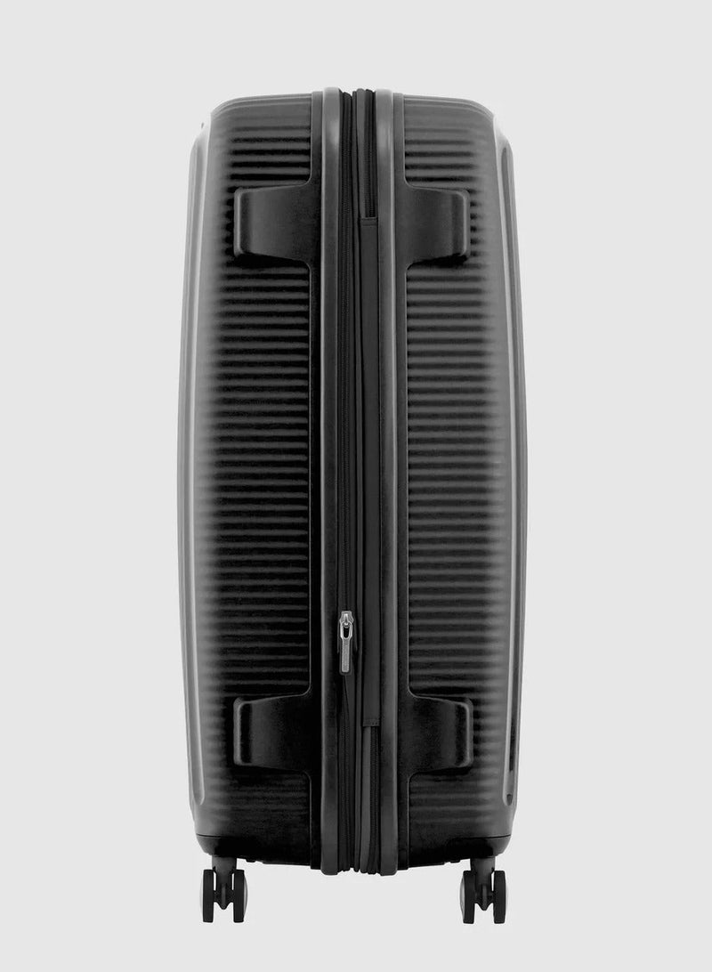AMERICAN TOURISTER حقيبة كوري (صندوق الصوت) بحجم تسجيل الوصول 80 سم / 30 بوصة، 4 عجلات دوارة، سطح صلب، بولي بروبيلين، أسود|سحاب أمان DuoSaf™|مساحة داخلية واسعة|قابلة للتوسيع|قفل TSA|خفيفة الوزن - ضمان دولي لمدة 3 سنوات - Image 4