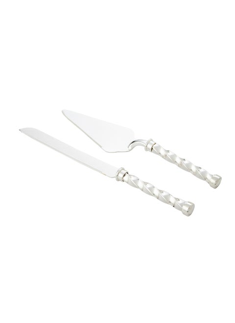 A set for cutting cakes and sweets consisting of a shovel and a silver knife