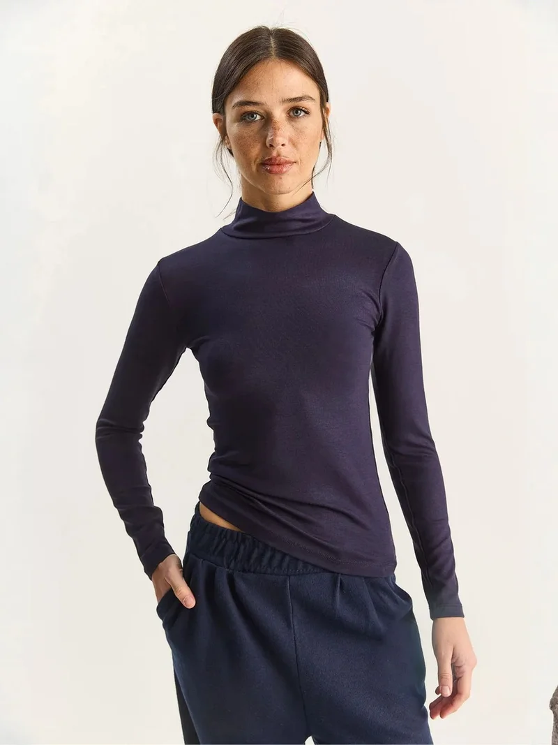 بيانكو لوتشي LUCCI Slim Fit Long Sleeve Half Turtleneck Top