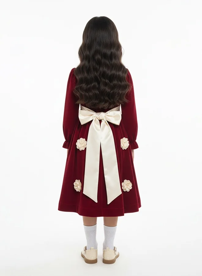 HAWRAA ABAYA Girls’ velvet dress in burgundy with floral details and a silky belt
