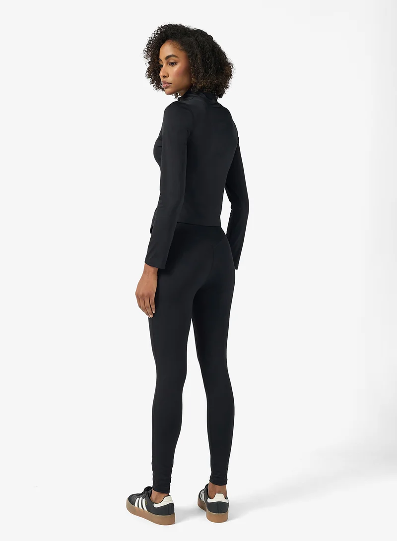 فورورد Sculpting Training Zip Up Top & Flared Legging Set