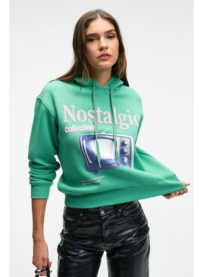 GRIMELANGE SLOPANE Women's Relaxed Fit Hooded Printed Green Sweatshirt.