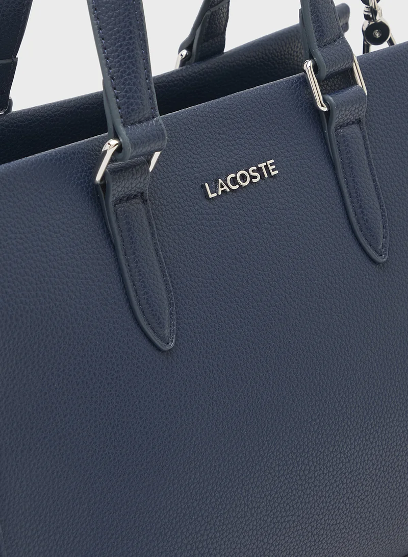 لاكوست حقيبة ساتشل بمقبض علوي وشعار