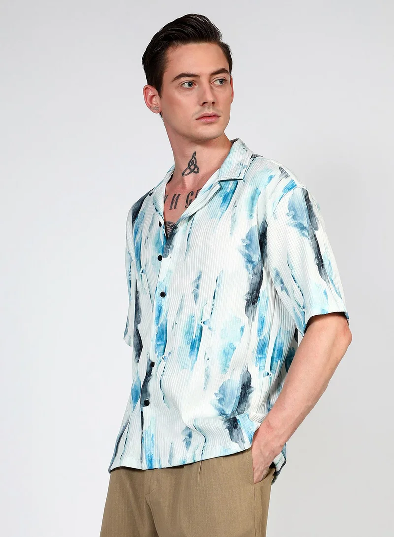 Campus Sutra Campus Sutra Men's Sky Blue Oversized Water Strokes Shirt For Casual Wear | Cuban Collar | Short Sleeve | Button Closure | Shirt Crafted With Comfort Fit For Everyday Wear