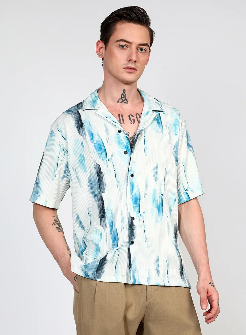 Campus Sutra Campus Sutra Men's Sky Blue Oversized Water Strokes Shirt For Casual Wear | Cuban Collar | Short Sleeve | Button Closure | Shirt Crafted With Comfort Fit For Everyday Wear