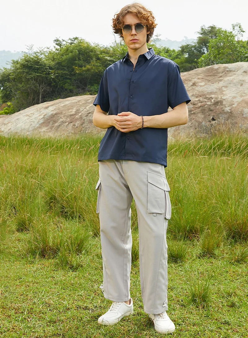 Campus Sutra Campus Sutra Men's Prussian Blue Satin Oversized Shirt For Casual Wear | Spread Collar | Short Regular Sleeves | Button Closure | Oversized Shirt Crafted With Comfort Fit For Everyday Wear