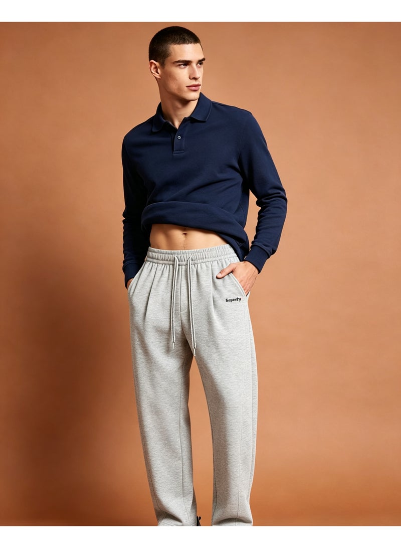 سوبر دراي Superdry Straight pants for men and women in autumn loose casual sports pants - Image 3