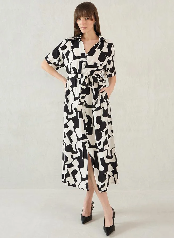 فيميلا Femmella Abstract Print Collared Shirt Midi Dress with Belt Detail