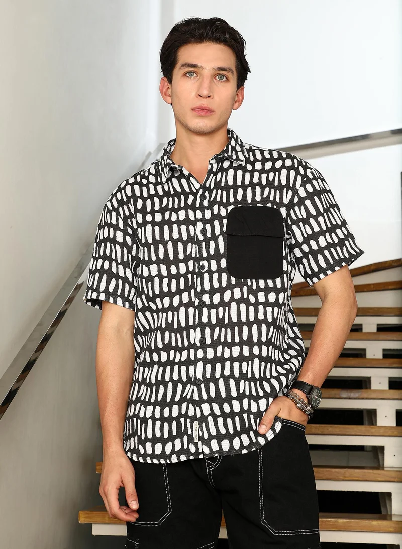 Campus Sutra Campus Sutra Men's Onyx Black:Chalk White Flap-Block Printed Oversized Shirt | Regular Fit Short Sleeve Point Collar Abstract Print | Cotton Blend & Breathable Fabric For Casual & Urban Wear