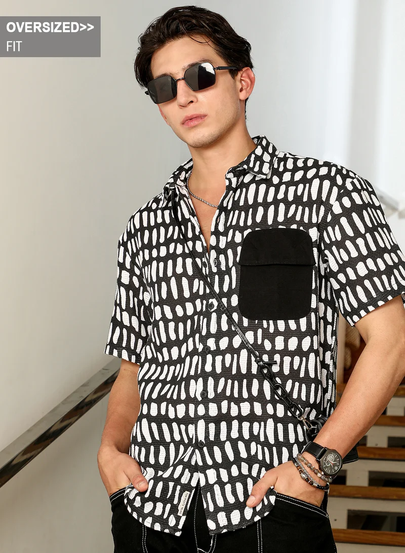 Campus Sutra Campus Sutra Men's Onyx Black:Chalk White Flap-Block Printed Oversized Shirt | Regular Fit Short Sleeve Point Collar Abstract Print | Cotton Blend & Breathable Fabric For Casual & Urban Wear