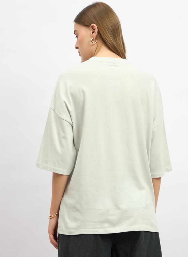 ستايلي تيشيرت فضفاض بأكتاف منسدلة وطبعة جرافيك - Image 5