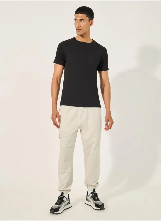 Styli Solid Pocket Detail Regular Fit T-Shirt