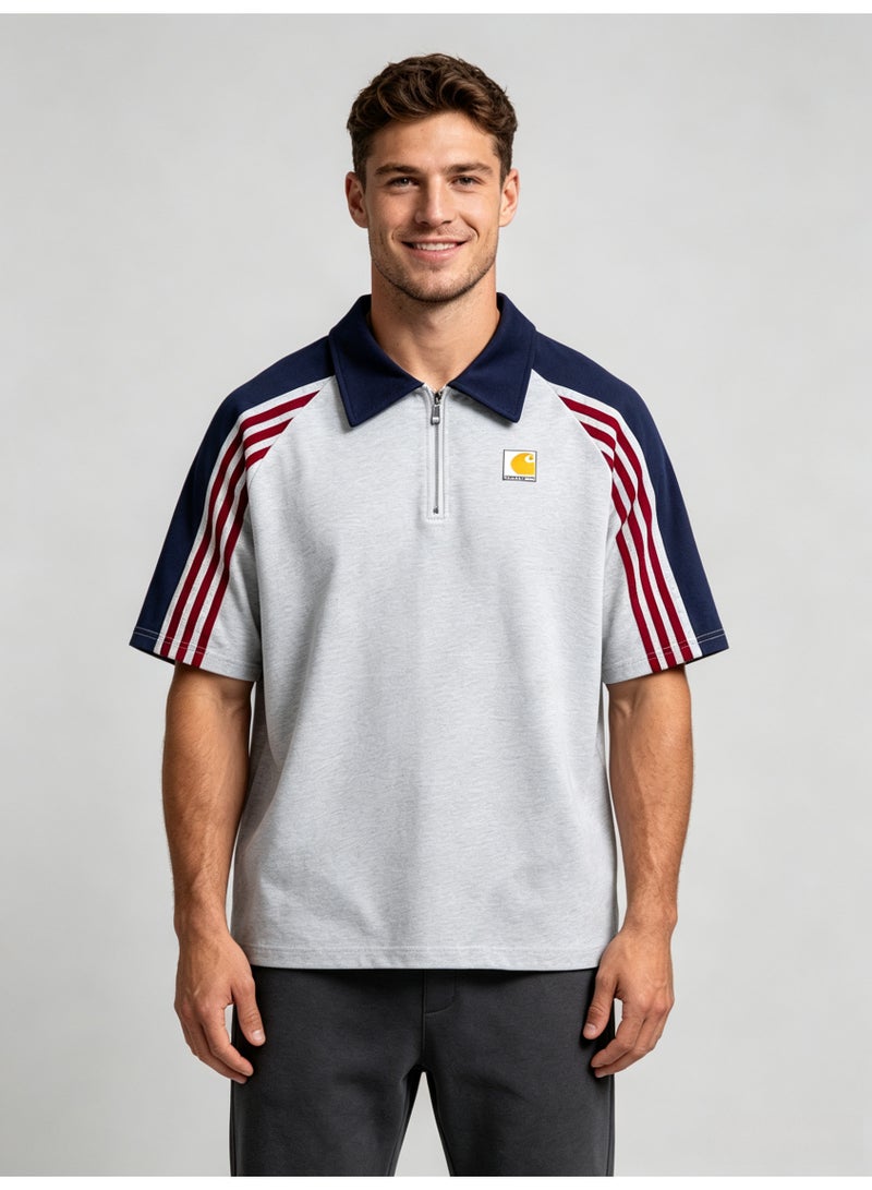 كارهارت Carhartt Men's Quarter Zip Short Sleeve Polo Shirt, Color‑Block Raglan Top with 3‑Stripe Sleeve Detail, Classic Square Logo Casual Streetwear Tee - Image 2