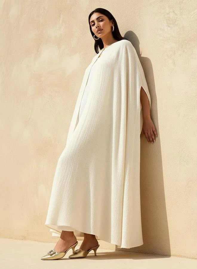 ايكونيك Iconic A-line Maxi Dress with Textured Design and Button Detail Cape