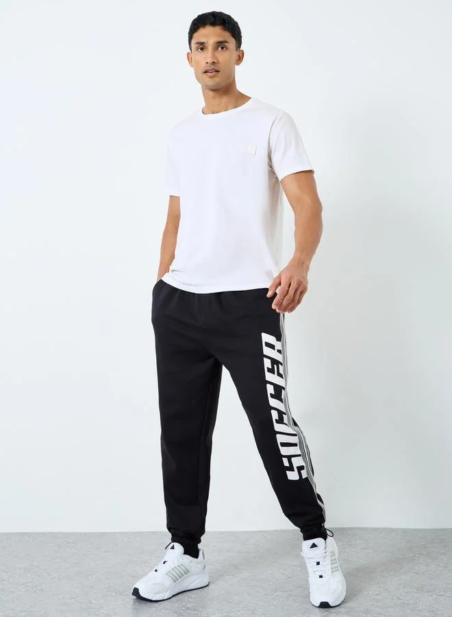 Styli Styli Men Black Graphic Oversized Joggers