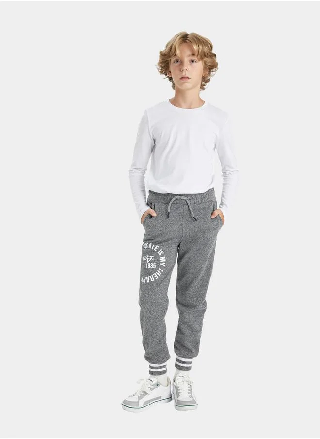 DeFacto Graphic Print Elasticated Joggers with Pockets by Styli