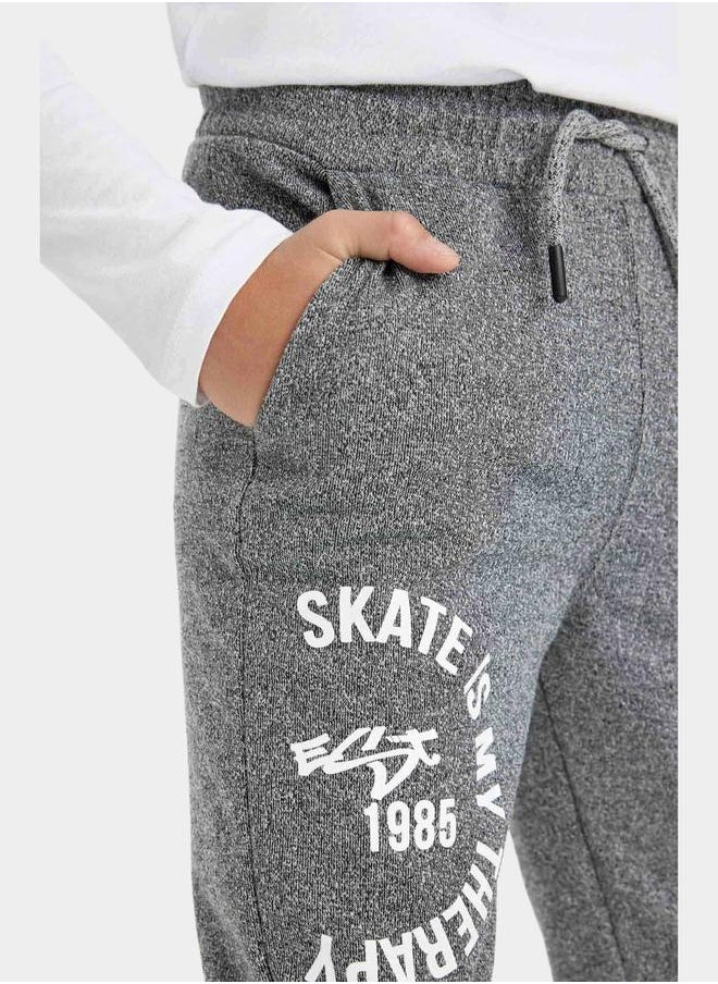 DeFacto - Graphic Print Elasticated Joggers with Pockets by Styli - Image 1