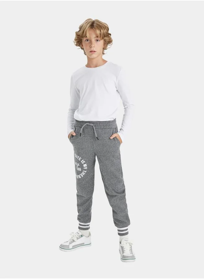 DeFacto Graphic Print Elasticated Joggers with Pockets by Styli