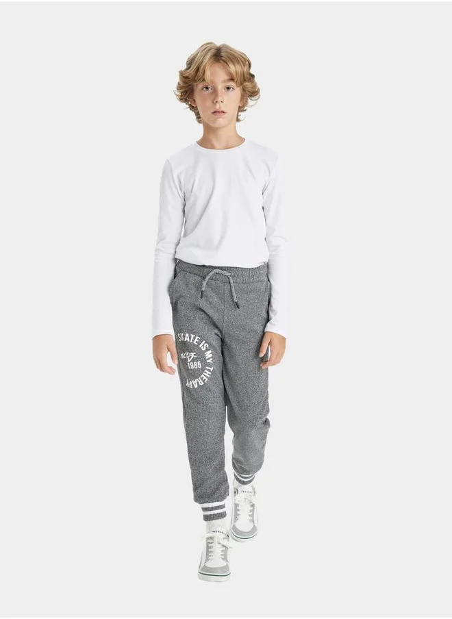 DeFacto Graphic Print Elasticated Joggers with Pockets by Styli