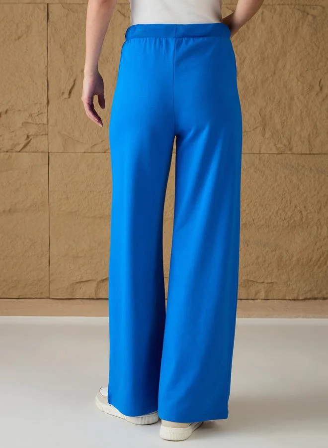 SASSAFRAS SASSAFRAS Mid Rise Terry Wide Leg Track Pants