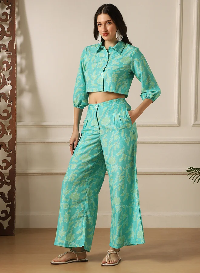 جلو باص طقم نسائي مطبوع بلوزة قصيرة وبنطلون واسع الأرجل