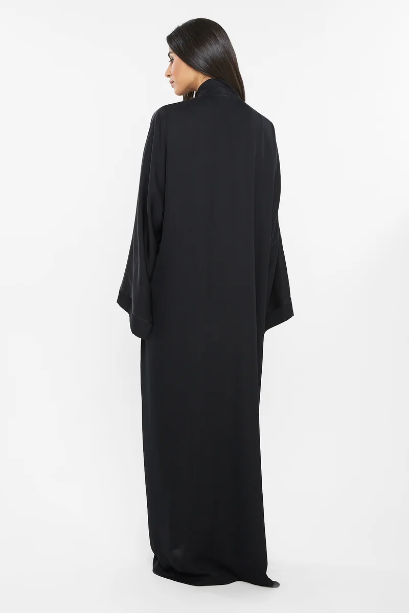 NUKHBAA A casual duo-colored abaya in dull cream and grey-AJ126A