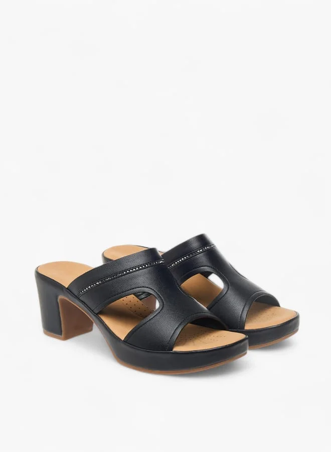 فلورا بيلا من شو إكسبرس صنادل نسائية سهلة الارتداء بكعب عريض مزين