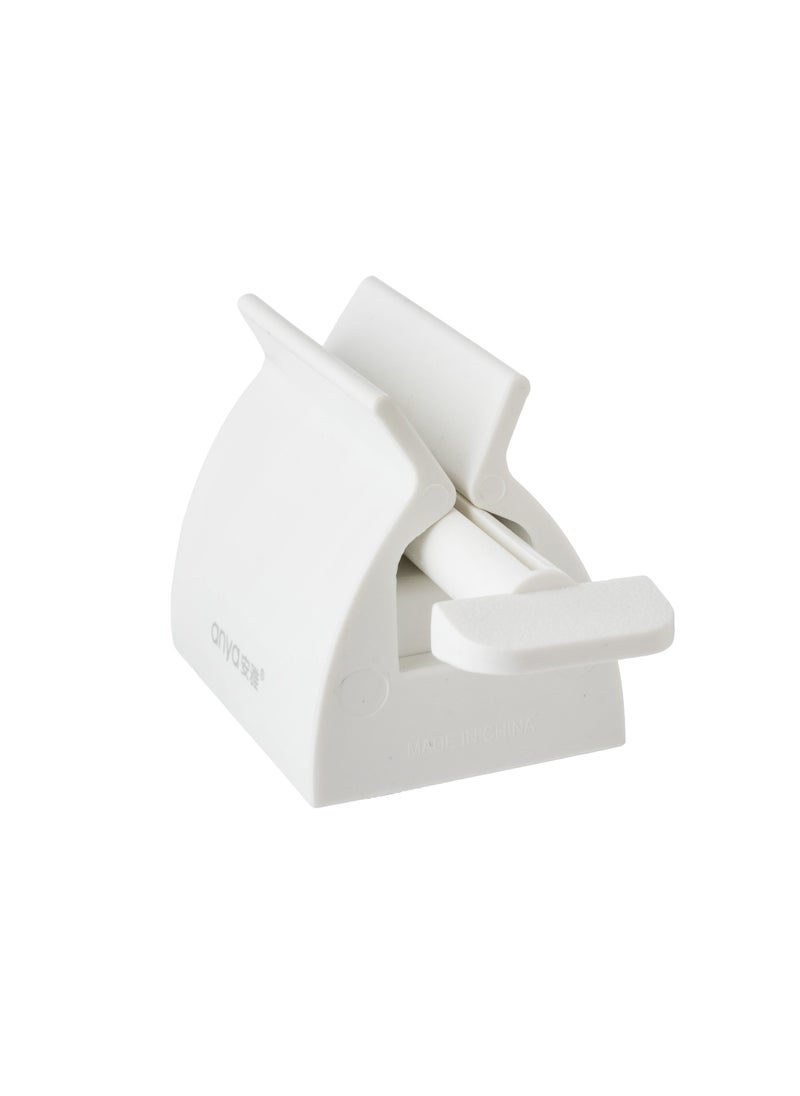 Plastic toothpaste squeeze tool